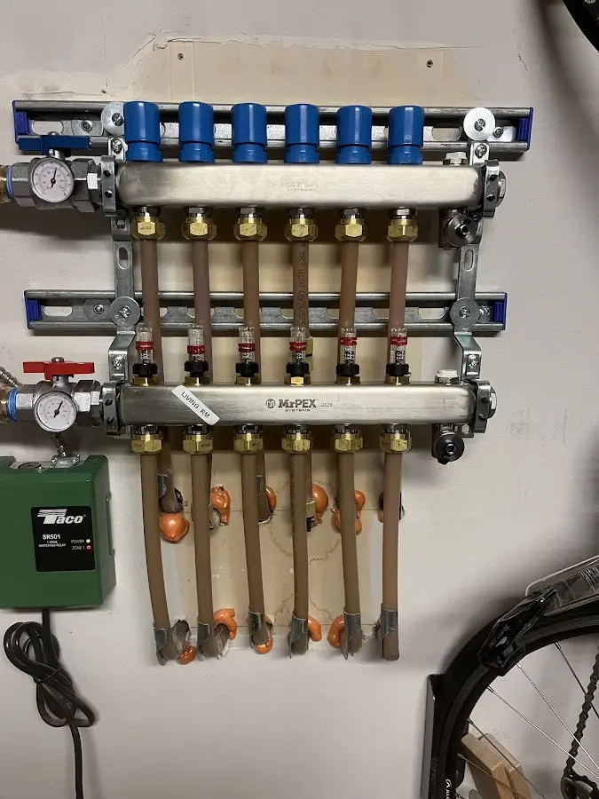 Plumber performing Water Heater Repair at a residential property in Richfield